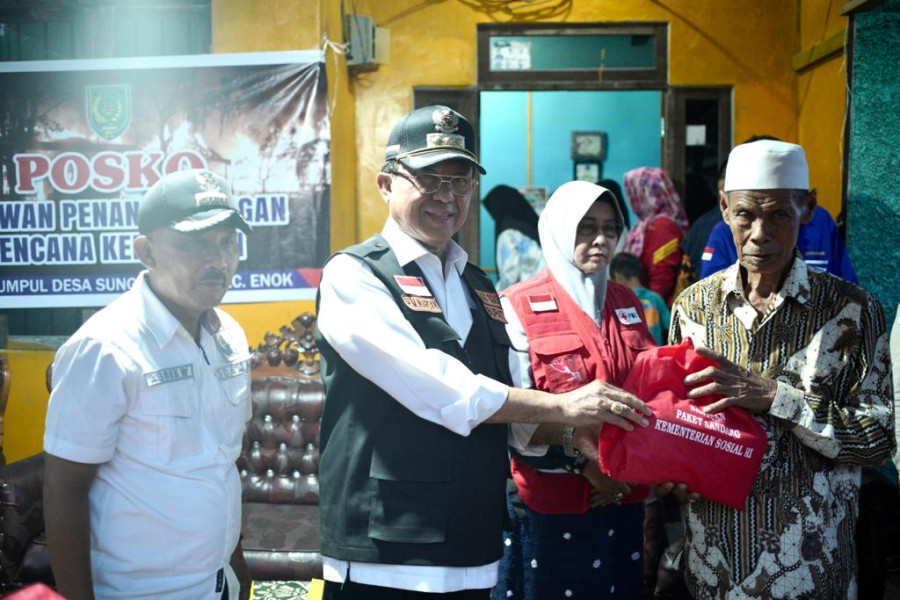 Gerak Cepat, Bupati HM Wardan Salurkan Bantuan Korban Kebakaran di Desa Sungai Lokan